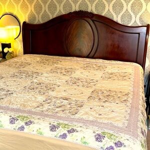 Twin Quilt purple floral and cream pattern with scallop hem.